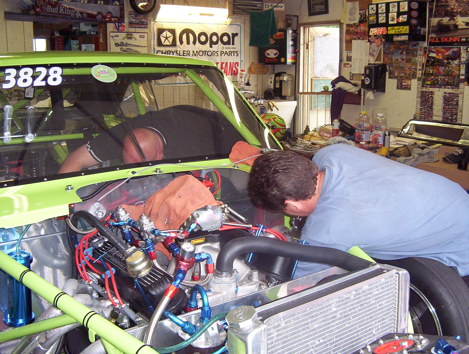 Making adjustments to the motor of his dart
